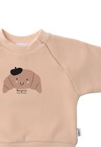 Beige sweatshirt with croissant print